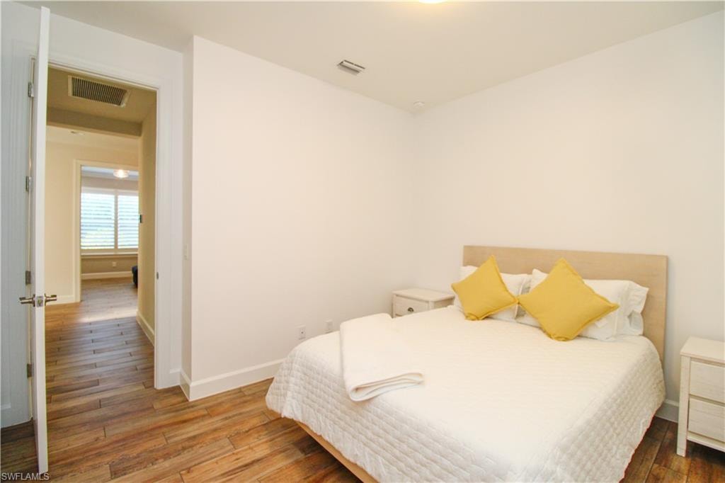 Bedroom featuring hardwood / wood-style flooring