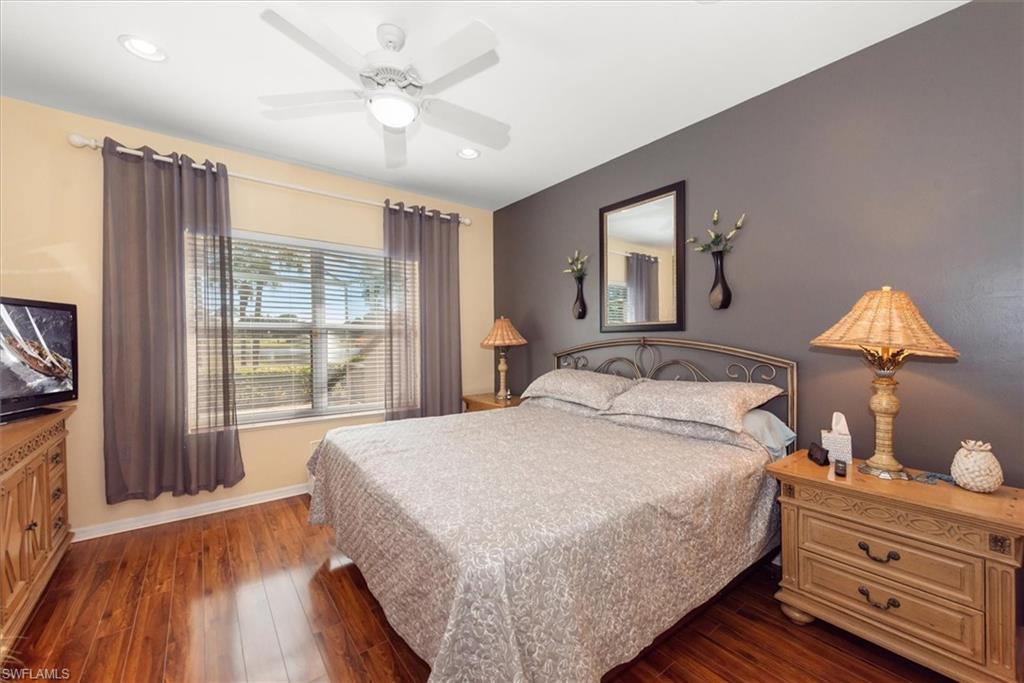 Spacious main bedroom with upgraded flooring!
