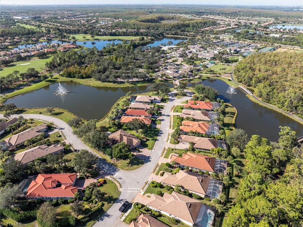 Vicenza neighborhood aerial view including lake with fountain water feature!