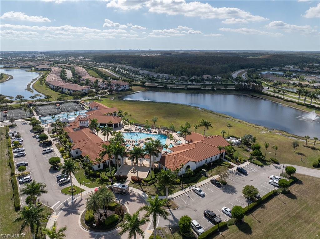 Aerial view of a nearby body of water and a pool area