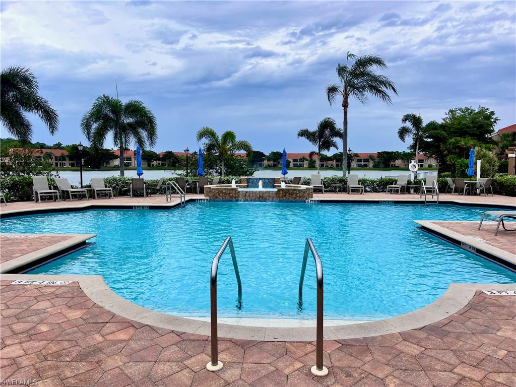 Community pool featuring a patio area