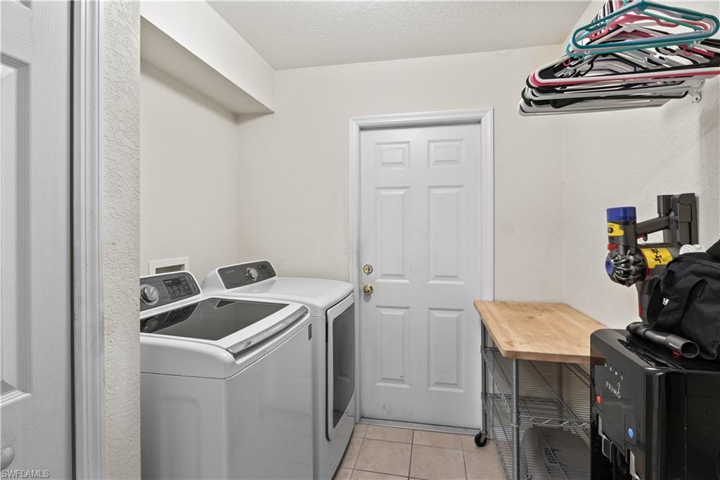 The huge laundry room is spacious and functional, designed to make household chores a breeze.