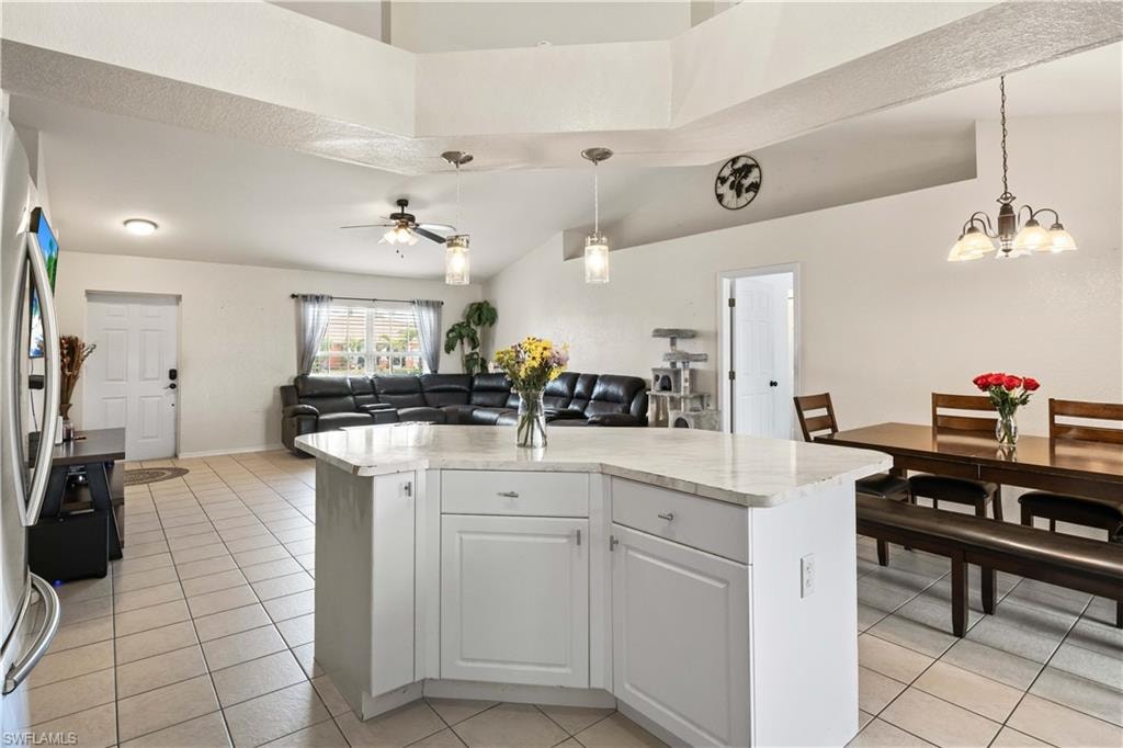 he kitchen’s open design flows effortlessly into the living and dining areas, creating a perfect environment for both everyday meals and large-scale entertaining.