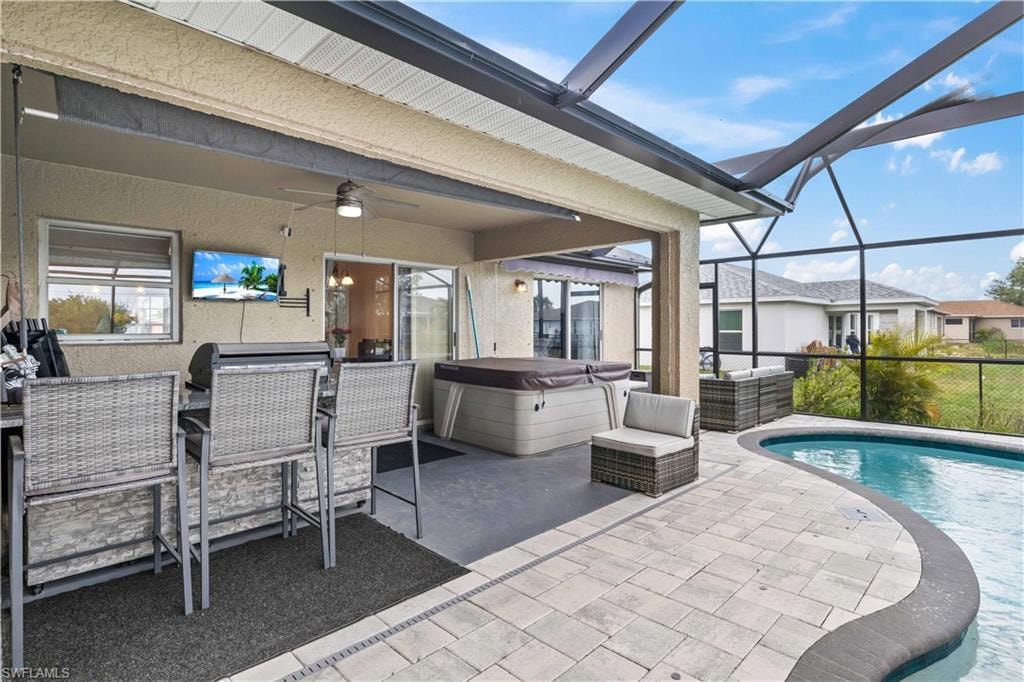 The outdoor space features a stunning pool complemented by a separate, luxurious spa, creating the perfect setting for relaxation and entertainment.