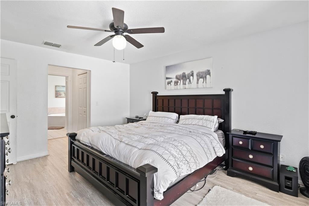 The primary bedroom is a spacious and tranquil retreat, designed for comfort and relaxation.