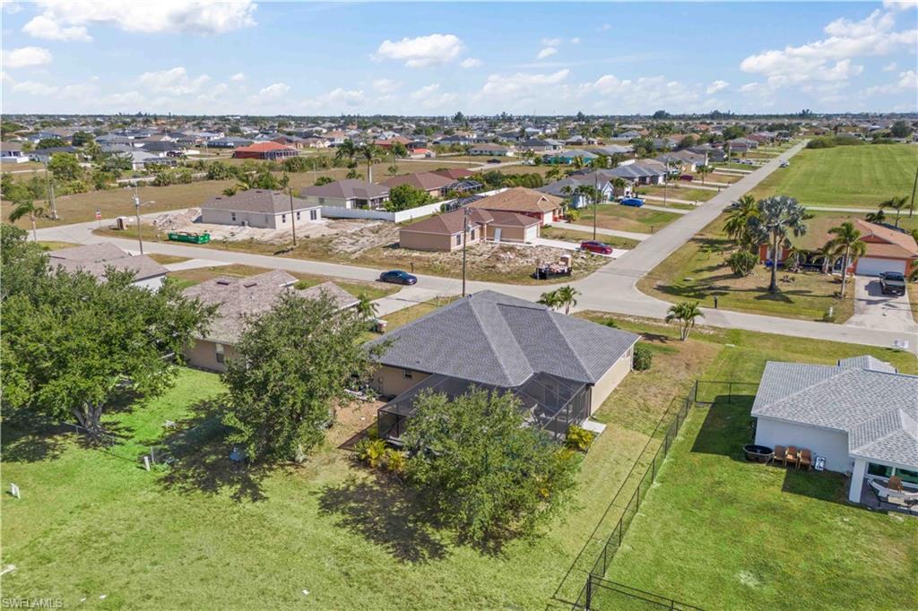 Aerial view, the house stands out with its spacious, well-designed layout and meticulously landscaped surroundings.