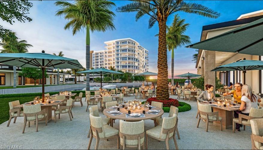 Artist's rendition of Patio terrace at dusk and outdoor dining area