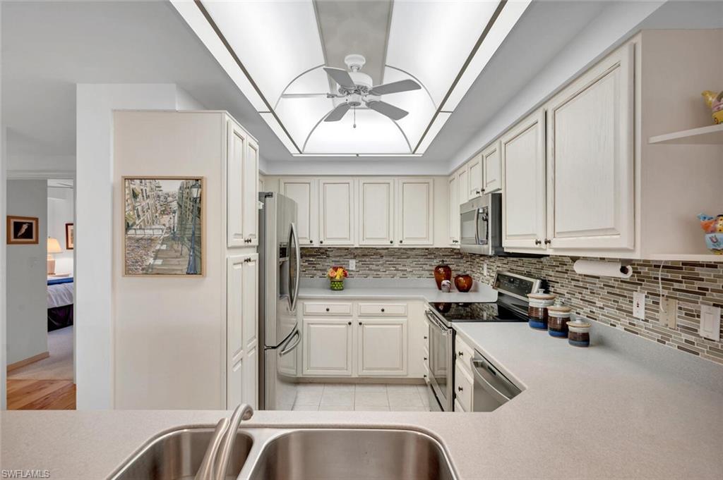 Stainless Steel appliances and corian countertops