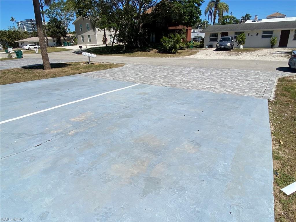 Excellent parking with brick pavers and concrete pads off street.