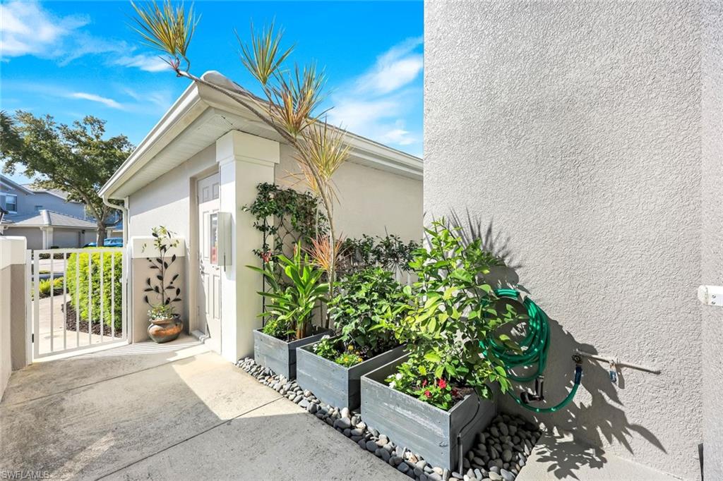 private entry through the gate or garage