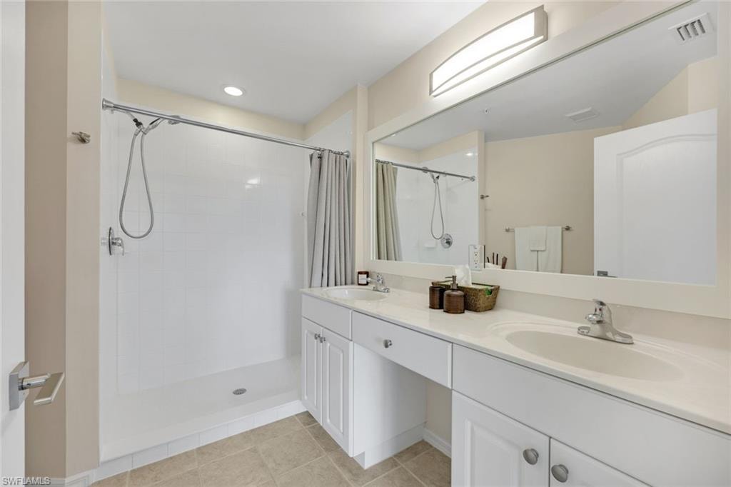 dual sinks and step-in shower