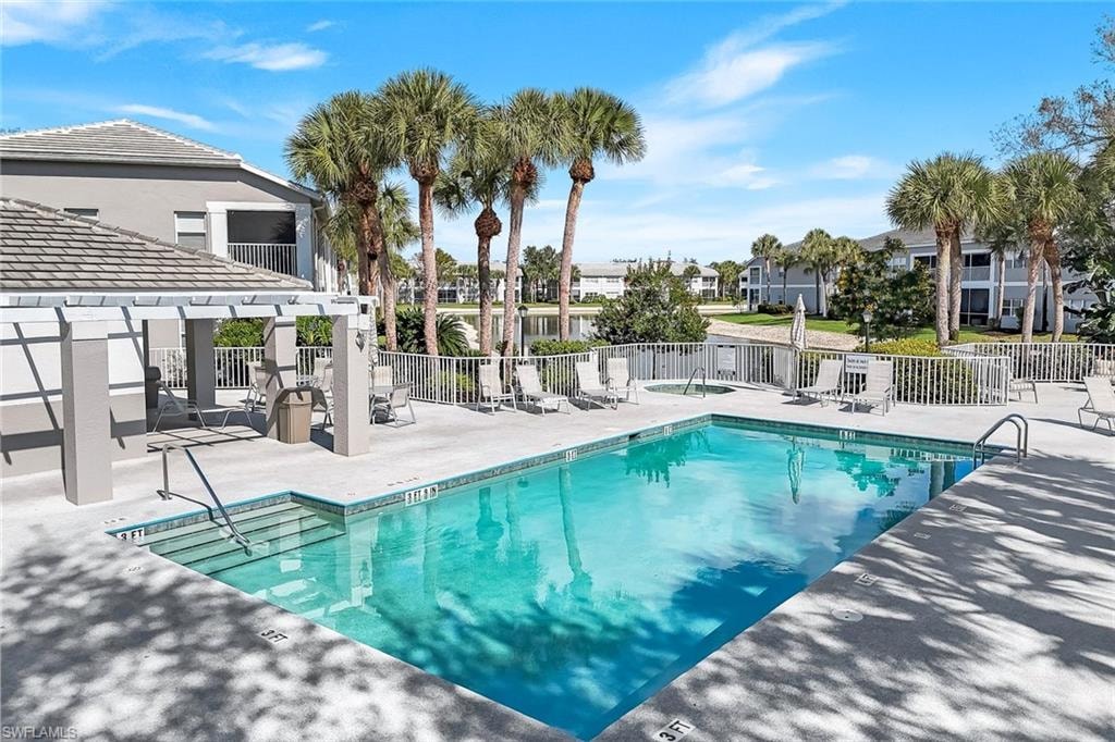 Summerwind pool/spa area with bathroom and seating areas