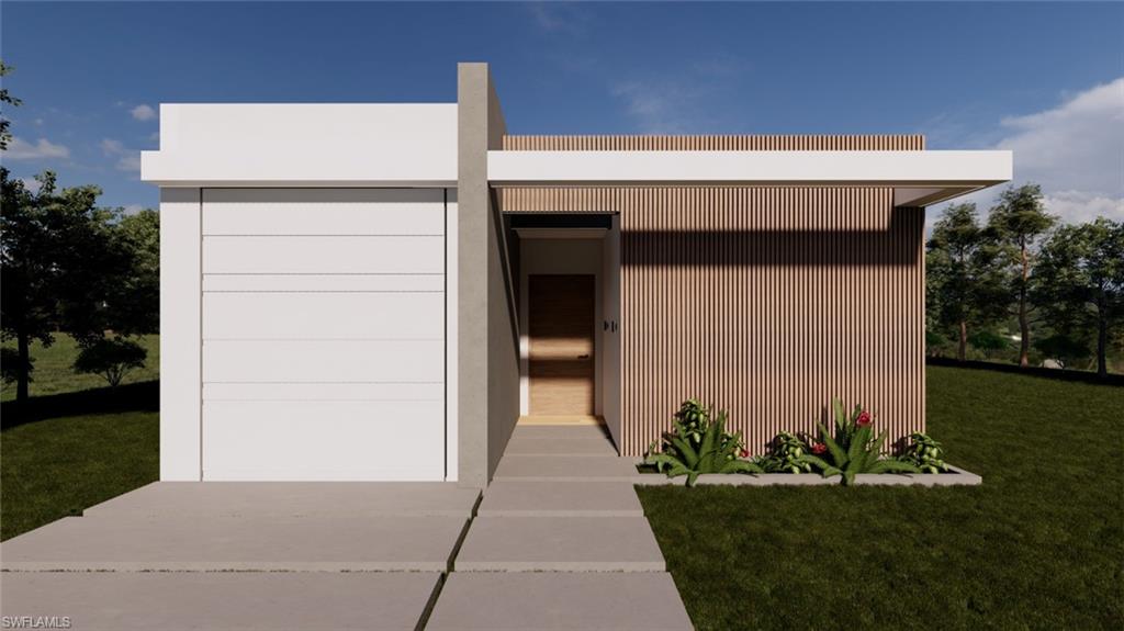 Contemporary house featuring a front yard
