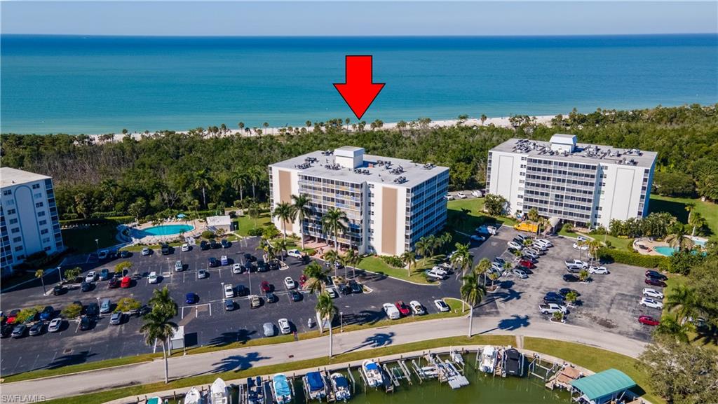 Bird's eye view of a large body of water and apartment complex