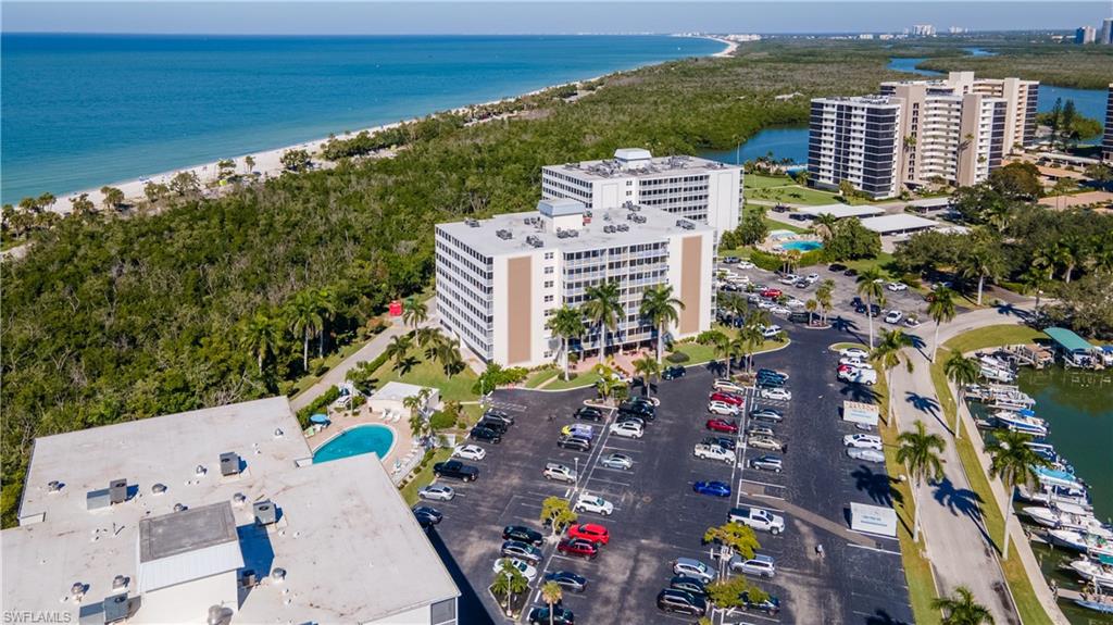 Bird's eye view of a large body of water and apartment complex / building