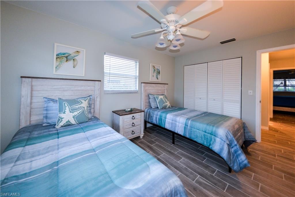 Third bedroom furnished with coastal decor