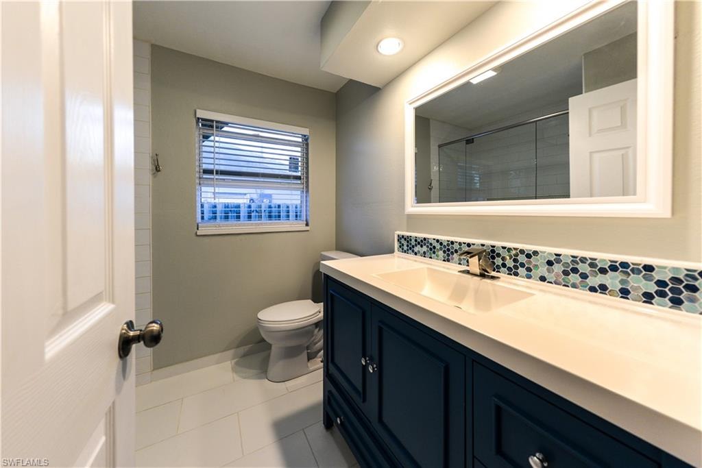 White porcelain tile and blue coastal accents