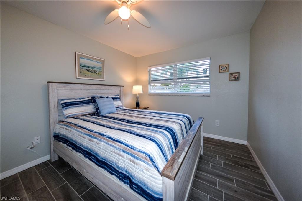 Secondary bedroom with porcelain tile floor