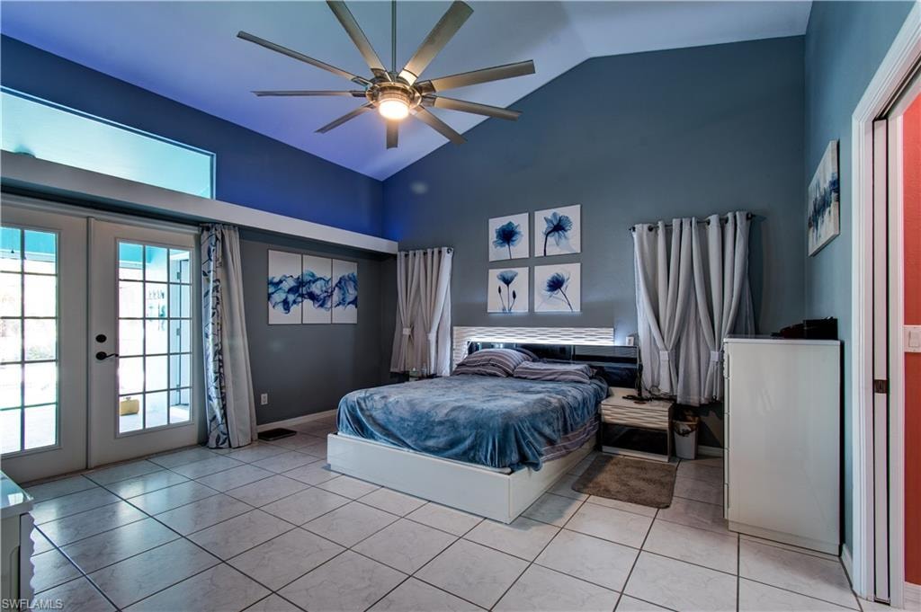 Bedroom featuring access to exterior, french doors, high vaulted ceiling, ceiling fan, and light tile patterned floors