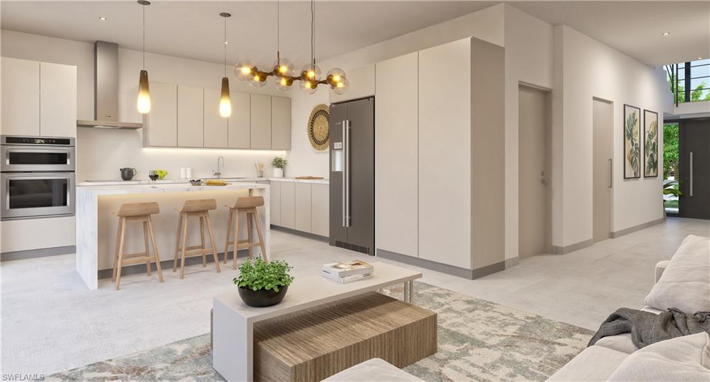 Living area featuring baseboards