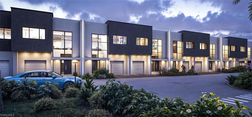 Modern home featuring stucco siding
