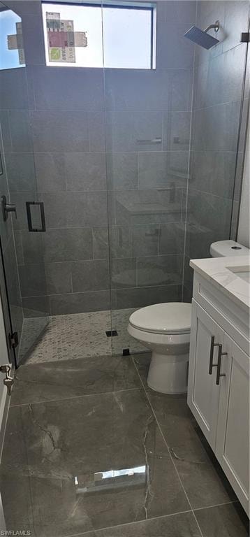 Full bath with vanity and a stall shower