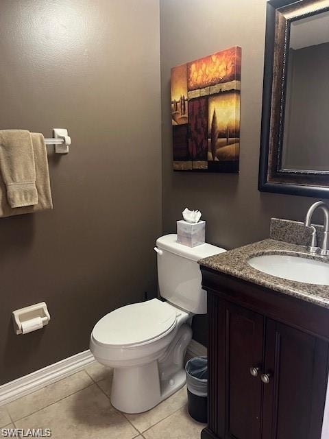 Bathroom with vanity and light tile patterned flooring