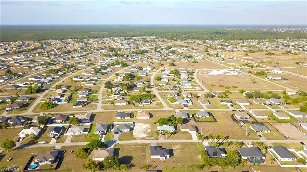 View of property location featuring nearby suburban area