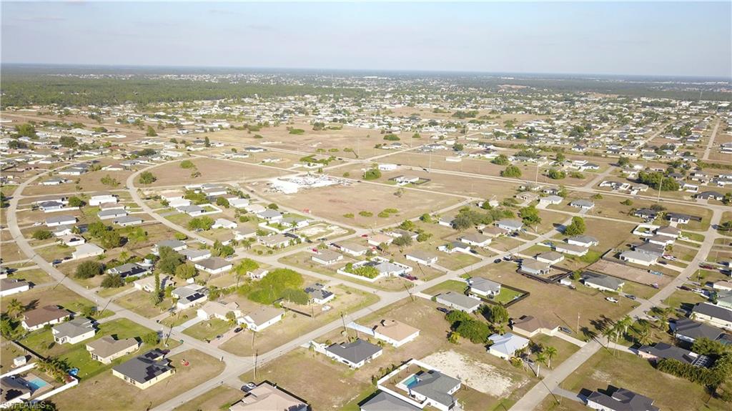 View of property location featuring nearby suburban area