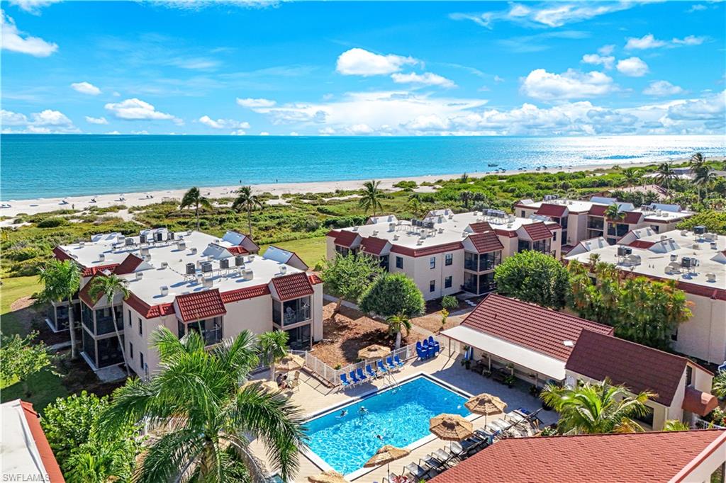 Gulf front community-tropical landscape, sand, shells and sea...
