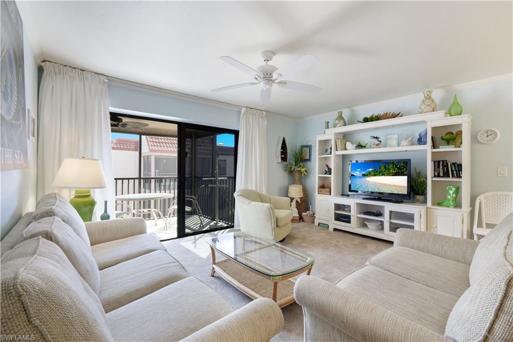 Comfortable Living Room seating with clear view out to Screened in and tiled Lanai...