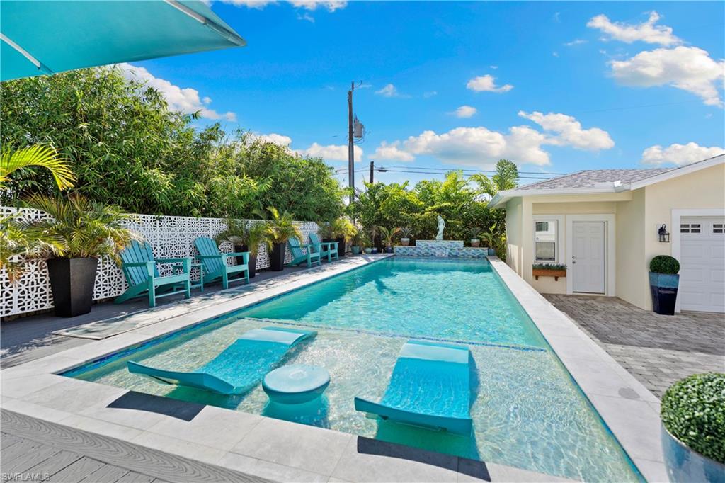 Lap pool with sun deck wrap around deck