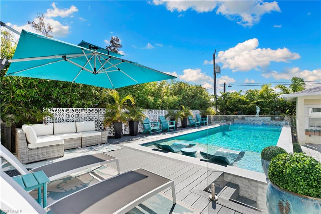 Sun deck, glass banisters with landscaped privacy