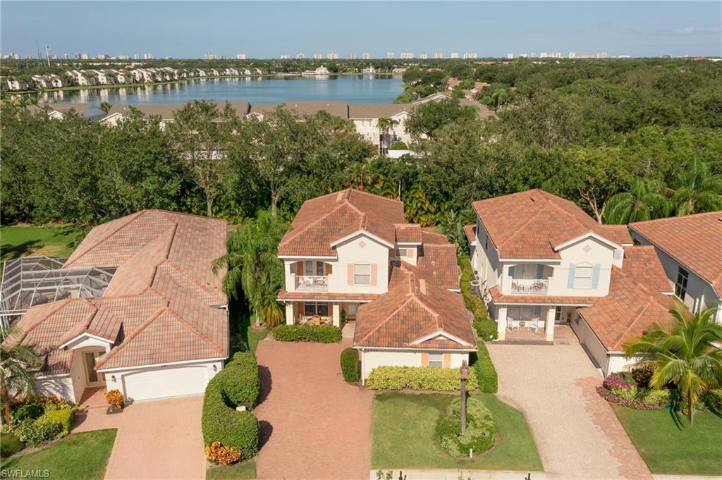 View of urban area featuring nearby suburban area and a nearby body of water