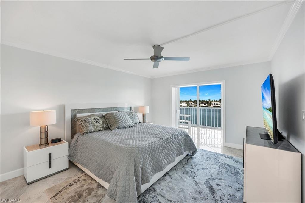 Bedroom featuring a ceiling fan, ornamental molding, and access to outside