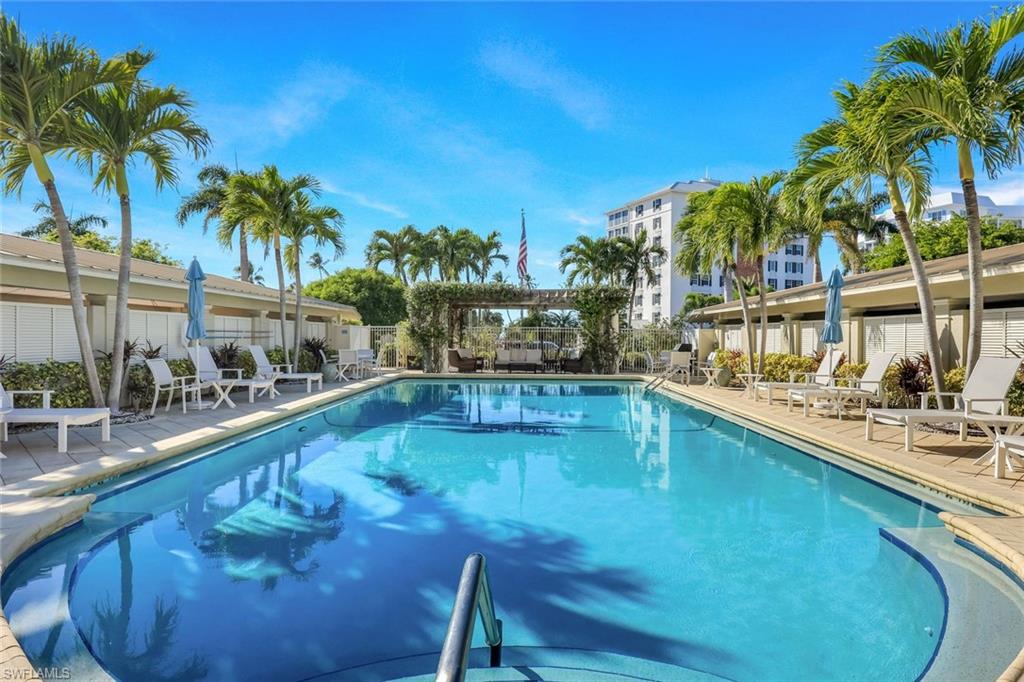 Community pool featuring a patio area