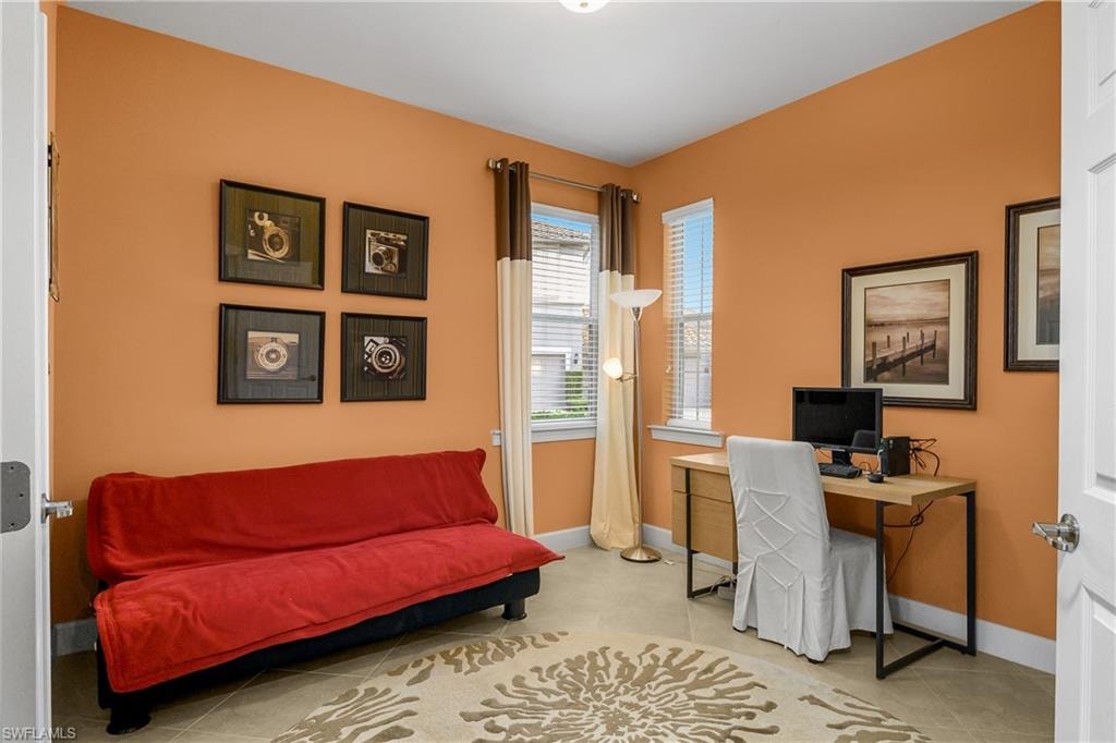 Den/Office space with french doors is located near the entry to the home and is versatile and large enough for an office and/or a pull out couch for additional guests. Add a closet and it makes the perfect 3rd bedroom.