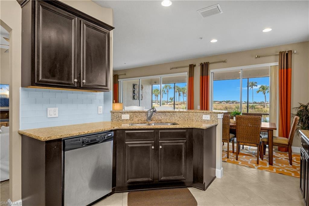 Open kitchen/dining/living area make this space perfect for entertaining guests.