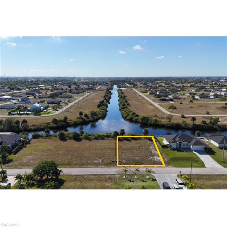 View of property location featuring property parcel outlined and a nearby body of water