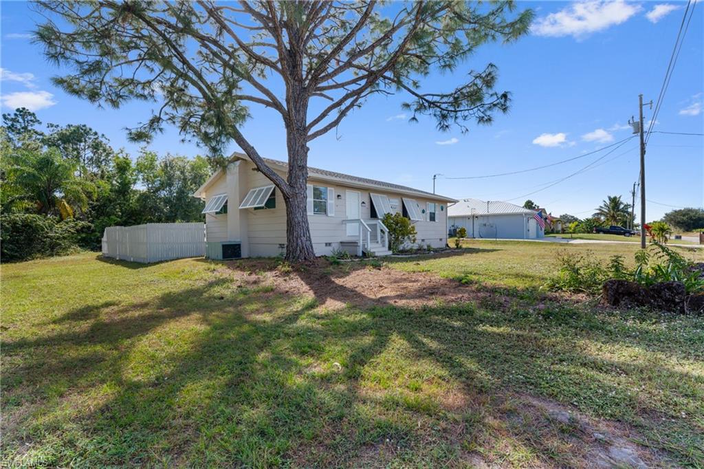 View of property exterior with crawl space