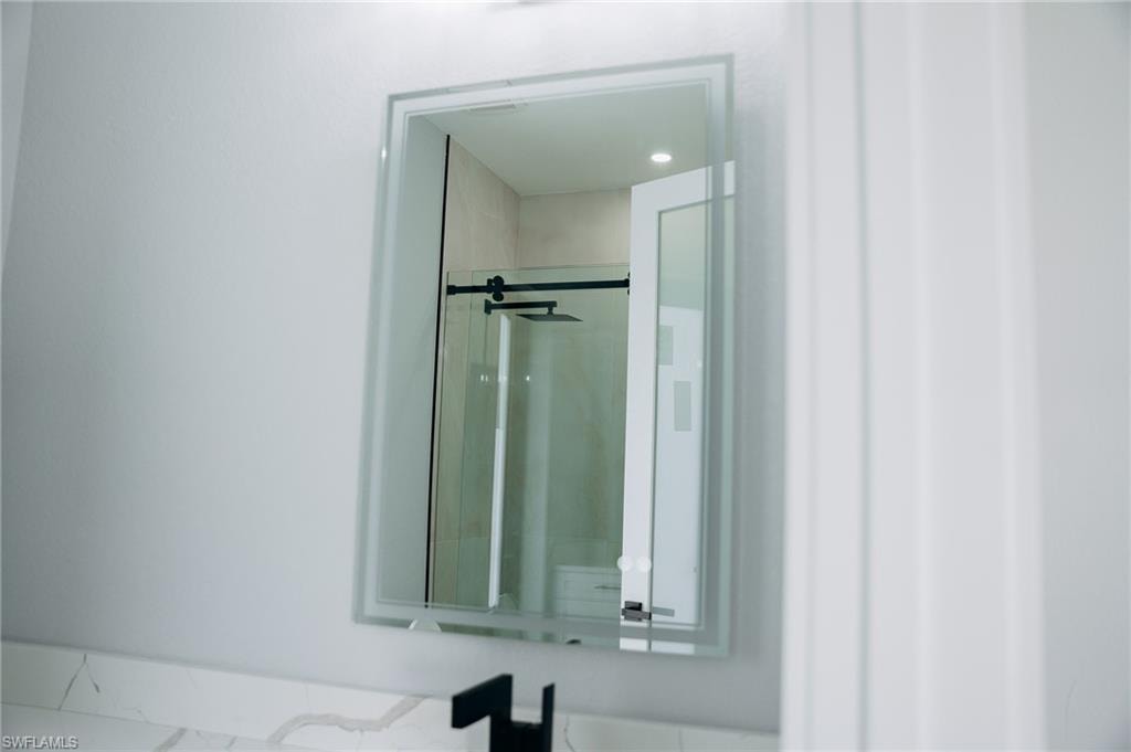 Bathroom view of a stall shower