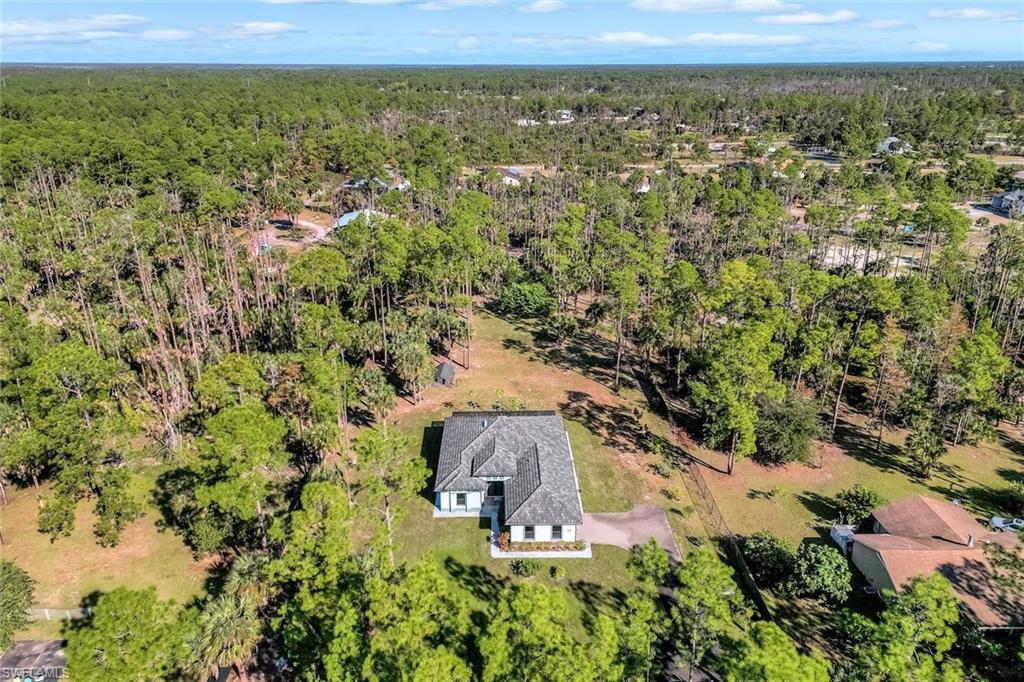 Drone / aerial view of a heavily wooded area