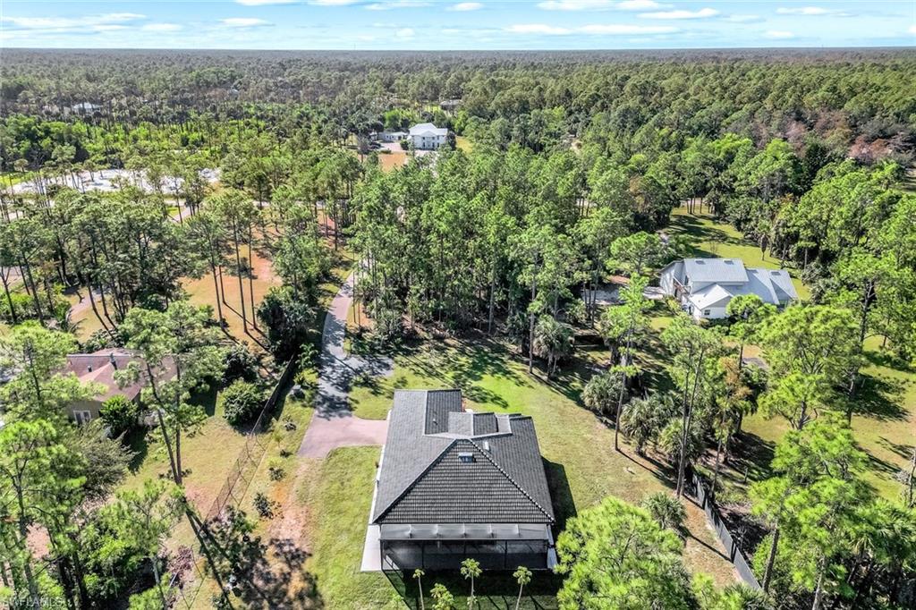 Drone / aerial view of a heavily wooded area