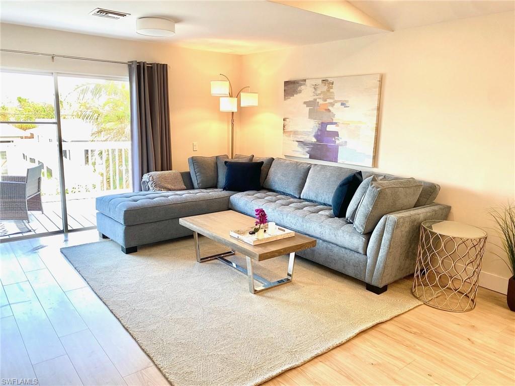 Living area featuring light wood-style floors