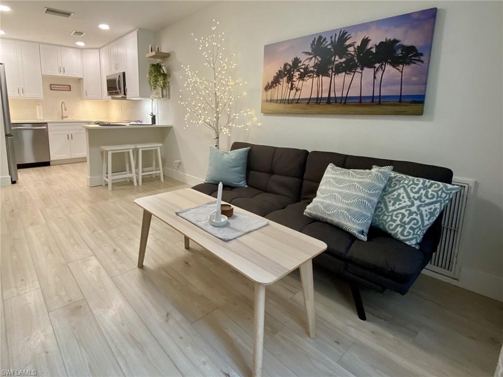 1st floor Living area featuring light wood-style flooring and recessed lighting