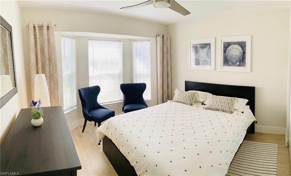 Bedroom featuring ceiling fan and light wood-style floors