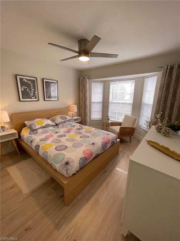 Bedroom featuring light wood-style floors and ceiling fan