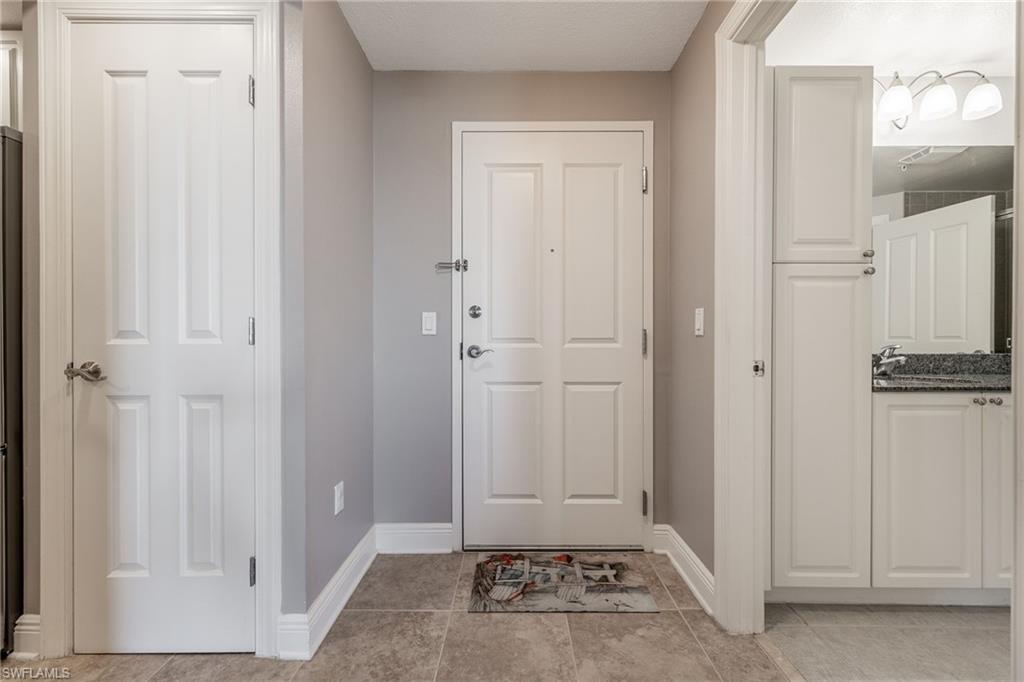 Entrance foyer featuring baseboards