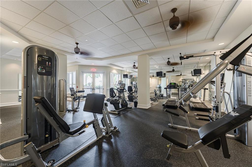 Workout area with a paneled ceiling