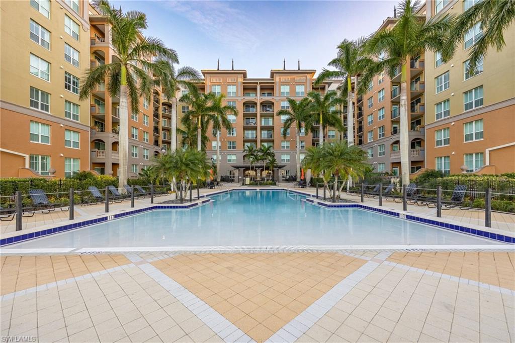Community pool featuring a patio